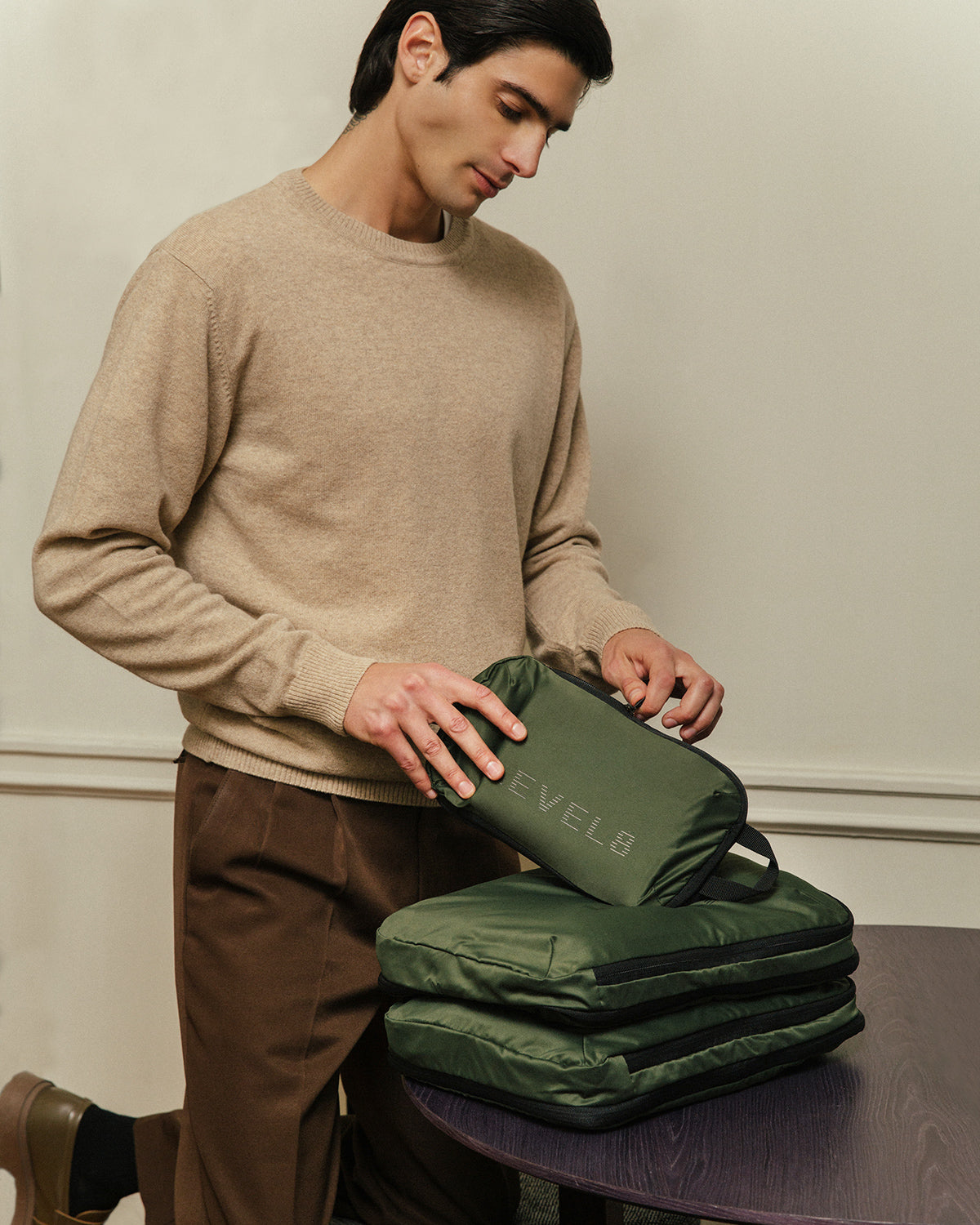 Man using Packing Cube Travel Set (6 pack) lifestyle scene